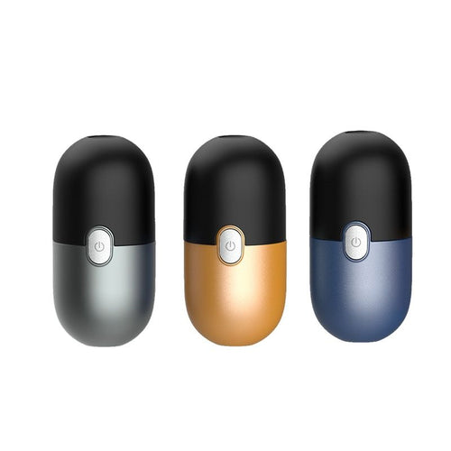 Three capsule-style mini electric shavers