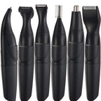 Black grooming kit with six interchangeable trimmer heads
