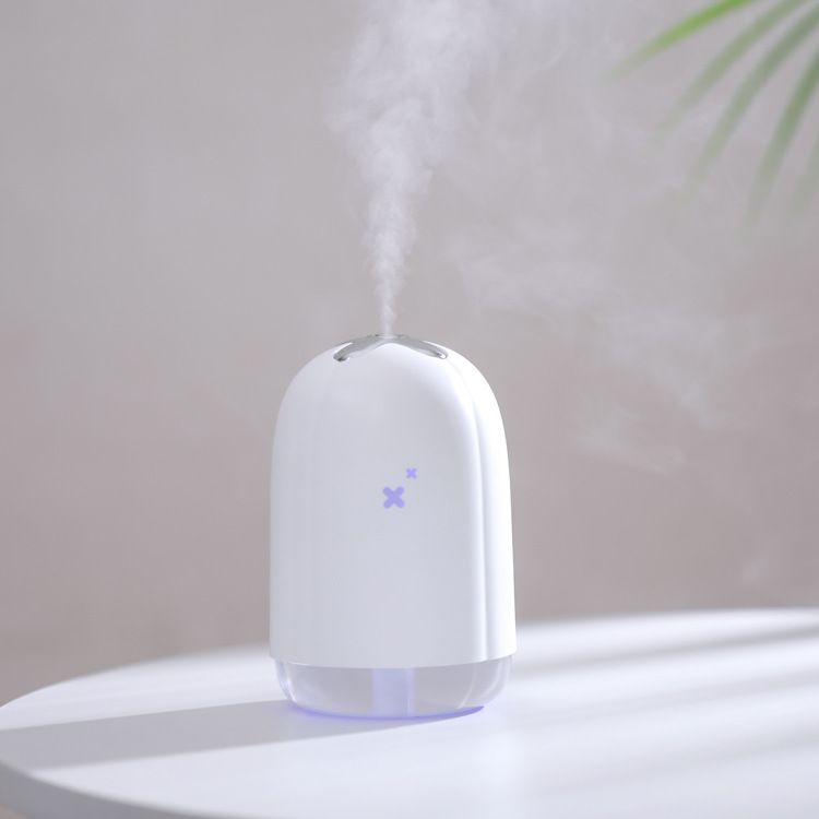 White spray humidifier producing mist