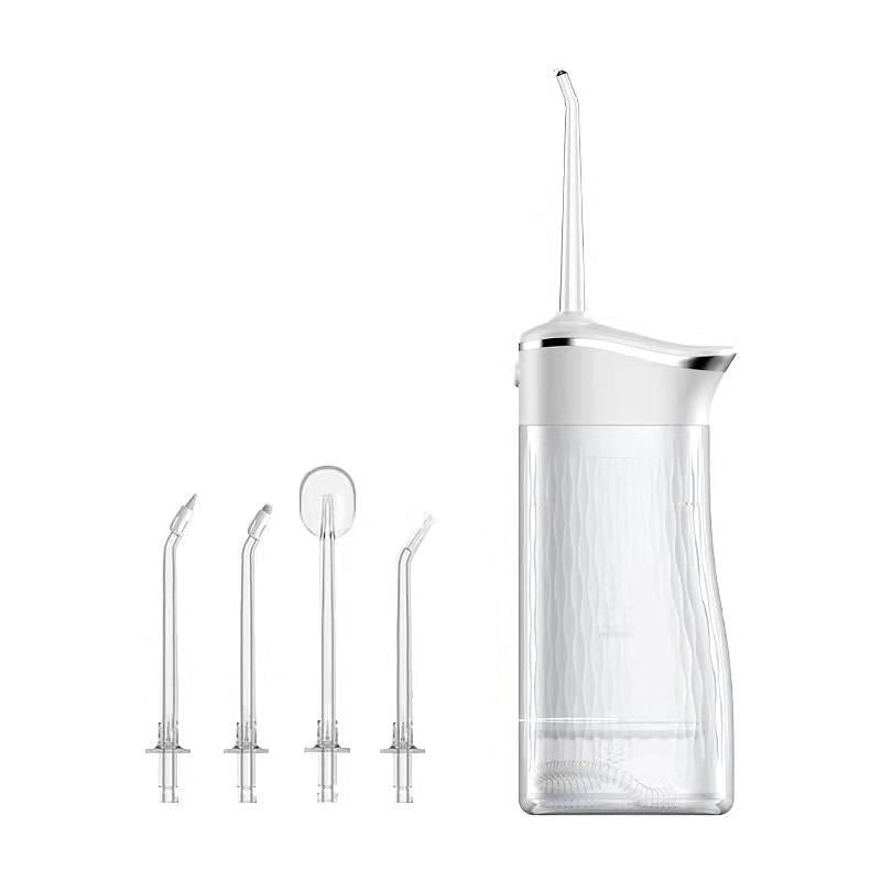 White cordless water flosser with four interchangeable nozzles