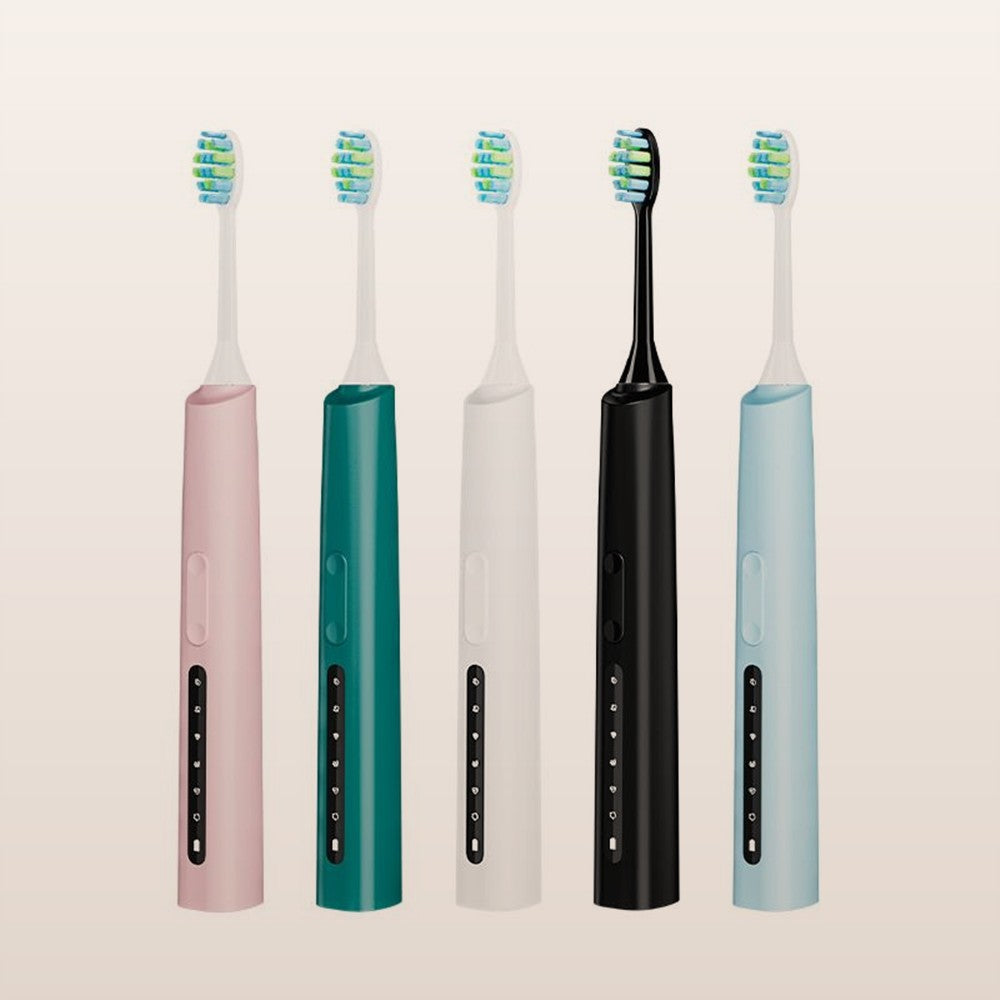Sonic electric toothbrushes in five colours on a warm neutral background