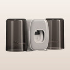 No-drill toothbrush holder with toothpaste squeezer on a neutral background