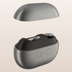 Electric nail clipper on a warm neutral background